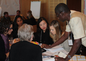 At Solutions Visioning, agribusiness experts discuss potential indicators for measuring their strategy against target outcomes. Photo Credit: GKI.